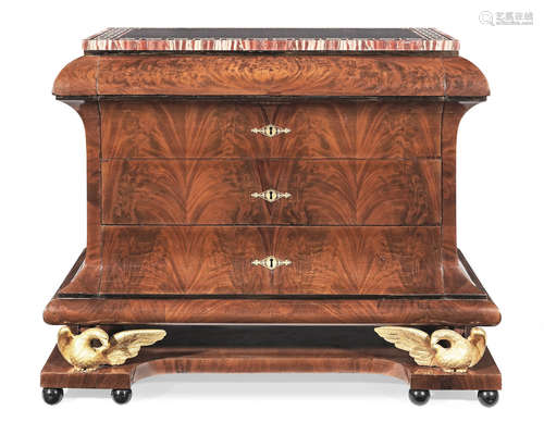 Early 19th century   A Biedermeier mahogany and gilt bronze bombe commode