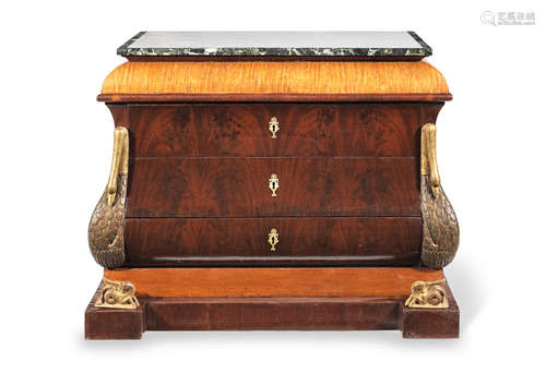 Early 19th century A Biedermeier mahogany, satinwood and parcel gilt bombe commode