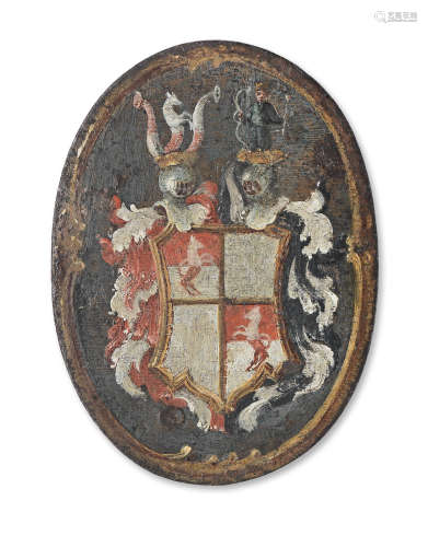 An 18th Century painted iron armorial badge