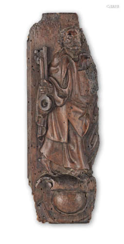 A Spanish 16th/ 17th century carved fruitwood panel fragment depicting St. Peter