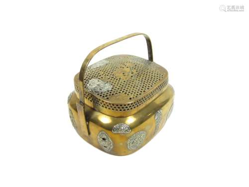 19th century A bronze hand warmer with reticulated cover