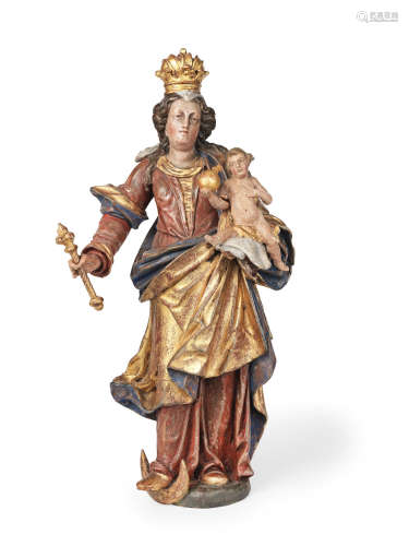 Early 18th century  A South German carved giltwood and polychrome decorated figure of the Madonna and Child