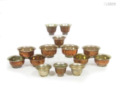 Himalayan Fourteen various copper and white metal Buddhist bowls