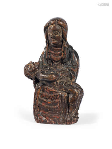 A 13th Century carved fruitwood polychrome figure of The Pieta