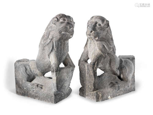 13th/ 14th century A pair of carved stone Stylobate Lions