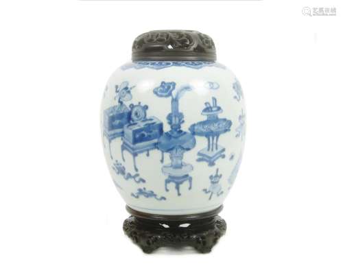 18th century A blue and white jar with wood cover and stand