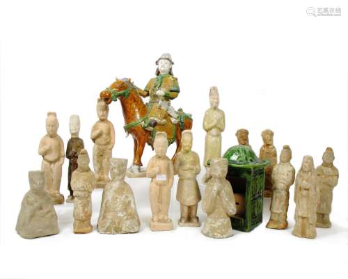 A collection of pottery funerary figures