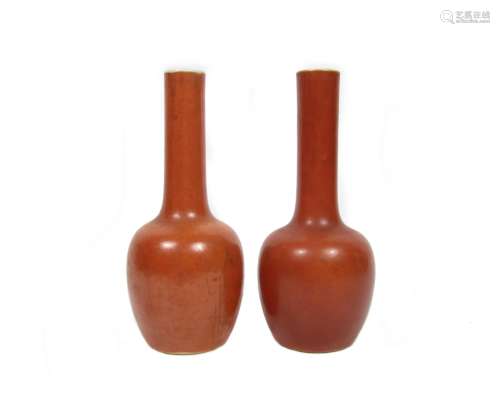 Bearing Kangxi six-character marks, but 19th century A pair of coral-red vases