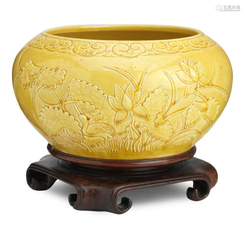 Kangxi incised six-character mark but 20th century A yellow-glazed bowl in the style of Wang Bing Rong