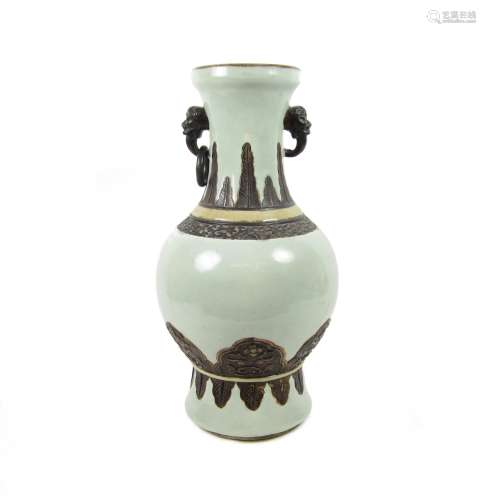 19th century A celadon and faux-bronze vase