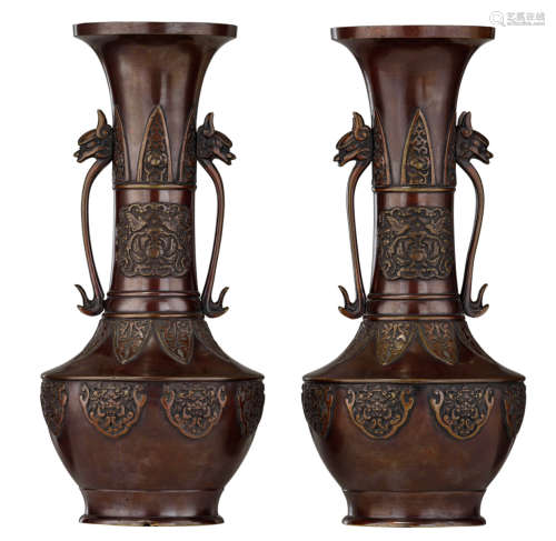 A pair of Chinese Ming type bronze gu vases, decorated with Taoti masks within lingzhi lappets, the neck and shoulder with petals, the central with a lotus flower and a pair of birds, the handles mythical beast's head shaped, H 31 cm     