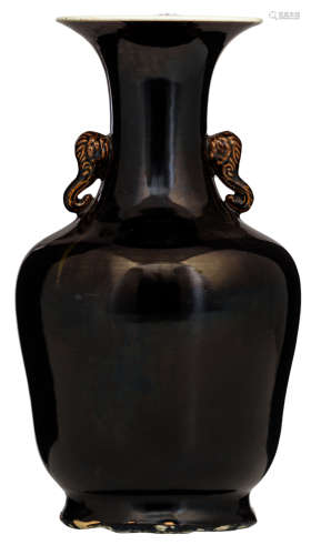 A Chinese monochrome blue glazed vase, paired with elephant's head handles, with a Yongzheng mark, H 34 cm