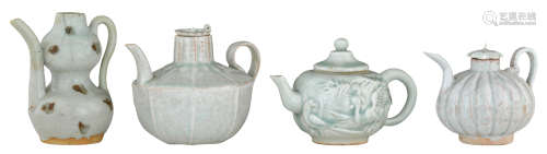 Three Chinese Song style qingbai ware teapots, one teapot pumpkin-shaped, another teapot shaped like a lotus leaf, the third teapot relief decorated with birds and phoenix; added: a ditto celadon glazed double-gourd jug, some possibly Song, H 8,5 - 11 cm    