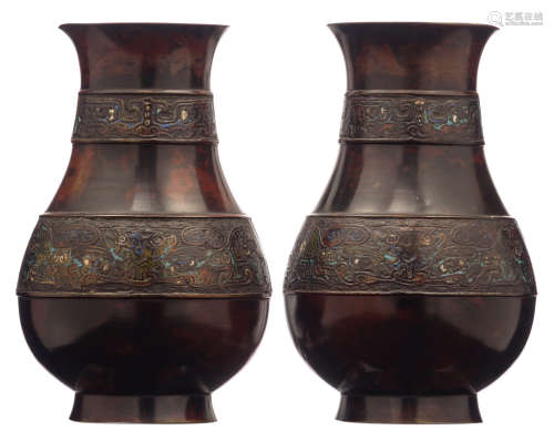 Two Oriental champlevé enamel bronze vases, decorated with lingzhi and taotie masks, H 22 cm