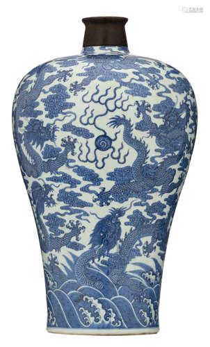 A Chinese blue and white large meiping vase, decorated with dragons, wallowing amongst clouds and above crashing waves, with a Qianlong mark, H 55 cm