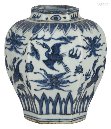 A Chinese Ming type blue and white hexagonal vase, decorated with wallowing cranes and lotus blossoms, the bottom rim and shoulder with flower petals, H 18,5 cm