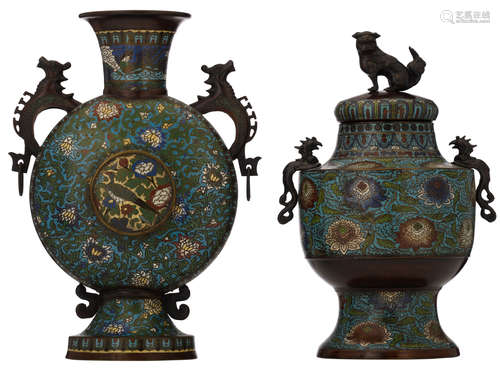 An Oriental champlevé enamel bronze moonflask, decorated with scrolling lotus, a bird and with figures on the neck; added: a ditto vase and cover, decorated with lotus flowers, with a seated kylin on the cover, H 47,5 - 50 cm 