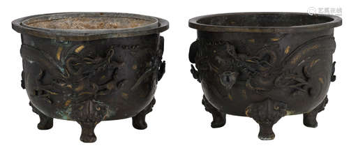 A pair of Japanese bronze cache pots, relief decorated with a dragon and a phoenix, H 24 - 24,5 - ø 33,5 - 34 cm