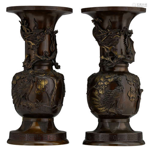 Two Oriental bronze vases, relief decorated with a dragon and a phoenix, H 56 cm   