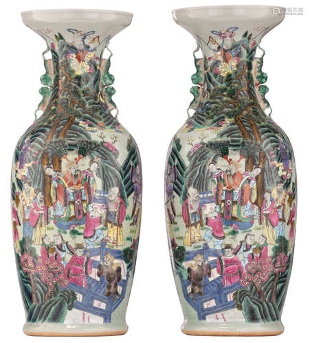  A pair of Chinese celadon ground vases, famille rose decorated with Immortals, gathering in a garden setting, with Fu lion shaped handles, H 61,5 - 62 cm     