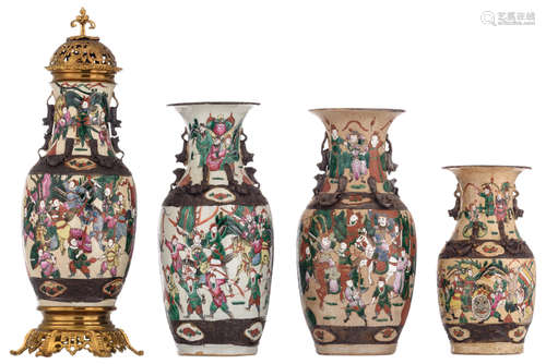 Three Chinese famille rose stoneware vases, decorated with a battle scene; added: a ditto vase with a mount, H 34 - 63 cm  