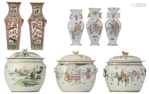 Three Chinese famille rose food recipients, decorated with a mountainous river landscape, a scene of the kylin, bringing the children, and high officials in a garden; added: three ditto vase-shaped wall appliqués, each appliqué decorated with a dignitary; extra added: a ditto pair of floral decorated quadrangular vases, H 14 - 23,5 - ø 20,5 cm    