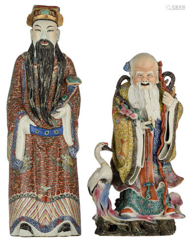 Two Chinese polychrome decorated porcelain figures, depicting Shou Xing with the crane and holding a bundle of peaches, and Fu Xing, holding a sceptre, with an impressed mark, H 52 - 66 cm