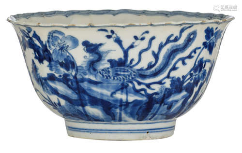 A Chinese blue and white flower bowl, decorated with a duck, a pair of birds, phoenix and cranes on flower branches, marked Kangxi, H 10 - ø 19,5 cm