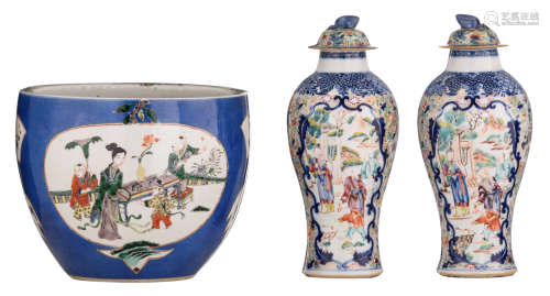 Two Chinese blue and white and Mandarin pattern export porcelain vases, the panels decorated with figures on a terrace, 18thC; added: a bleu poudré jardiniere, the roundels famille verte decorated with still lifes and playing children in a garden setting with scholar's items, with a Kangxi mark, H 19,5 - 27,5 - ø 24 cm