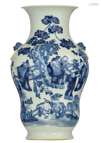 A Chinese blue and white begonia shaped vase, decorated with officials and boy attendants in a fenced garden setting, the garden is set with scholar's rocks, pine trees and a scholar's table with antiquities, with Fu lion's head handles, H 39 cm