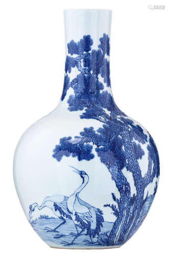 A large Chinese celadon blue and white bottle vase, decorated with cranes at a lakeside, H 67,5 cm