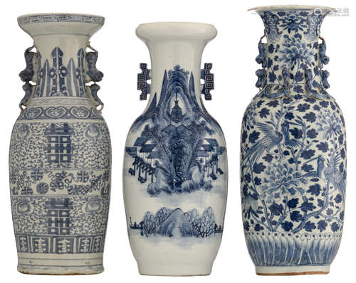 Three Chinese blue and white decorated vases, one vase with Shou signs and auspicious symbols, one vase with a pavilion in a landscape and one vase with birds on flower branches, the handles dragon-shaped, H 58,5 - 62 cm