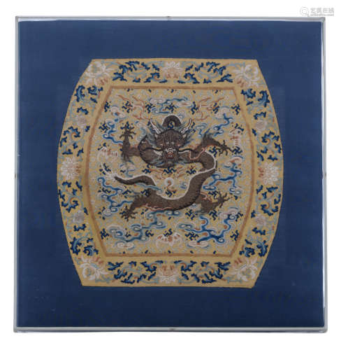An Imperial Chinese panel from an Emperor's elbow rest, embroidered in satin stitch and gold thread, ca. 1780, Qianlong period, 22,5 x 23 cm, framed, (bought in 1992 from Linda Wrigglesworth, 'Chinese Costume and Textiles', London)