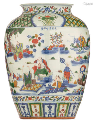 A Chinese wucai jar, decorated with the Eighteen Luohans in a landscape, with a Jiajing mark, H 45 cm
