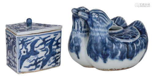 A Chinese Ming style blue and white 'double-duck'-form water dropper, H 8,8 cm; added: a ditto Ming type box and cover, decorated with cranes, flowers, fruits and fish, with a Wanli mark, H 8,5 - 10,7 - W 9,5 - 12,5 - D 7,5 - 13 cm
