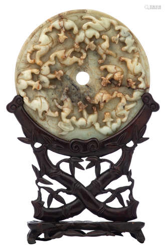 A Chinese sculpted jadeite Bi disk, decorated with crawling chilongs, H 43 (with base) - ø 25 cm