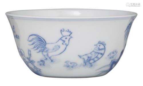 A Chinese blue and white teacup, decorated with cockerels in a garden, with a Yongzheng mark, H 4 - ø 8,3 cm