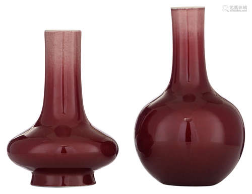 Two Chinese sang de boeuf bottle vases, late 19th/early 20thC, H 27 - 31 cm