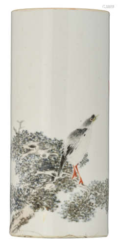 A Chinese Republic period cylindrical vase, polychrome decorated with a bird on a tree branch, with a signed text, H 28,5 cm   