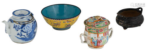 A Chinese Canton enamel yellow ground bowl with the Eight Buddhist symbols and bats, with a Qianlong mark; added: a Chinese Canton covered porcelain cup with handles and a ditto blue and white tea pot with flower branches; extra added: an incense burner, marked, H 7,5 - 13 - ø 12 - 17 cm  