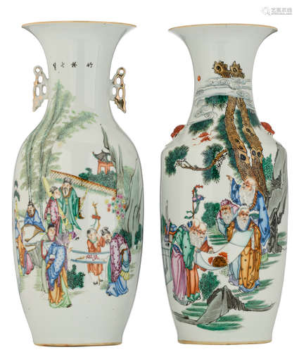 Two Chinese famille rose vases, both vases decorated with animated scenes with figures in a landscape and calligraphic texts, H 57 - 58 cm