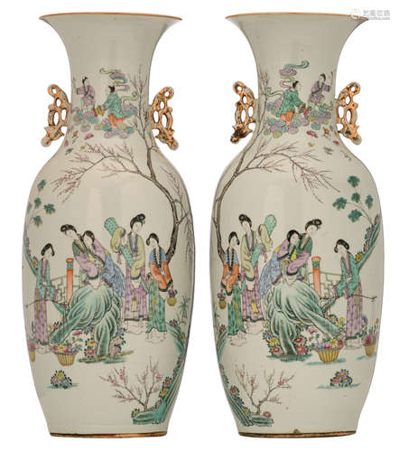 A pair of Chinese polychrome vases, decorated with beauties in a garden setting, the reverse with calligraphic texts, marked, H 57,5 - 58 cm