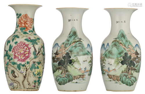 A pair of Chinese polychrome vases, decorated with figures in a mountainous river landscape; added: a ditto famille rose vase, decorated with flowers and flower branches, all vases with calligraphic texts, H 43 - 44,5 cm