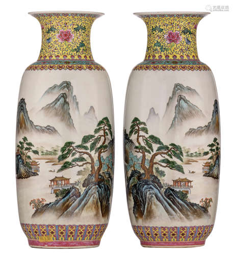 A pair of Chinese Republic period vases, decorated with a mountainous landscape, the reverse with a text, with a seal mark, H 61,5 cm  