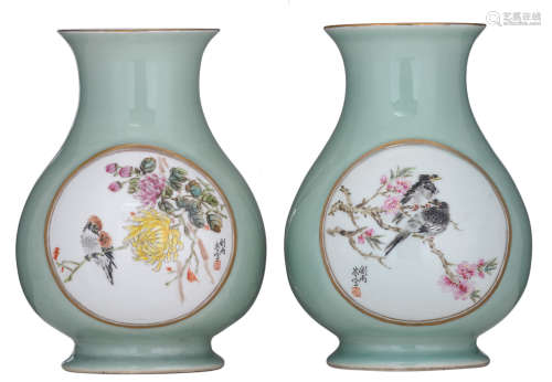 Two Chinese celadon-glazed hu vases, the roundels decorated with birds on flower branches, depicting the four seasons, dated 1962, signed, H 25,5 cm