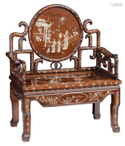 A Chinese exotic hardwood armchair with mother of pearl inlay, depicting figures near a pagoda, birds and dragons, H 119,5 - W 96  - D 54 cm