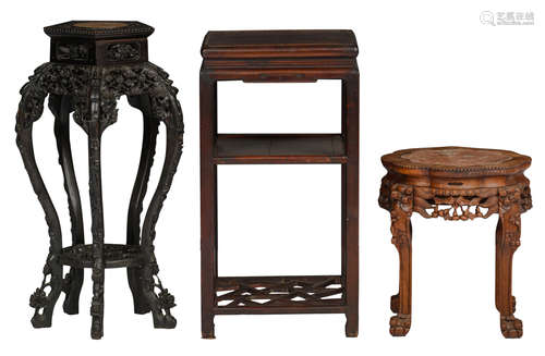 Two Chinese richly sculpted exotic hardwood bases with a marble top, H 46 - 83; added: a Chinese hardwood side cabinet, H 78 cm