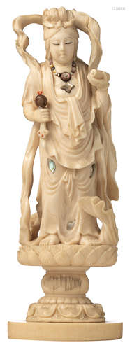 An ivory Bodhisattva, set with minor mother of pearl and coral decoration, late Qing Dynasty, H 18 cmAdded expertise report according to CITES legislation. For European Community use only.