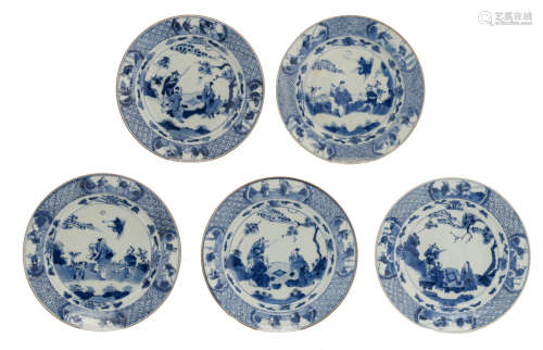 Three Chinese Kangxi blue and white plates, decorated with a fisherman, observing two men, playing a board game; added: two ditto plates with an Immortal, holding a peach, an attendant, a deer and a crane, 18thC, ø 21,5 cm     