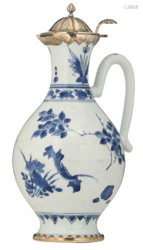 A Chinese Transitional blue and white floral decorated pear-shaped silver-mounted ewer, no visible hallmarks but tested on silver purity, H 26,5 cm 